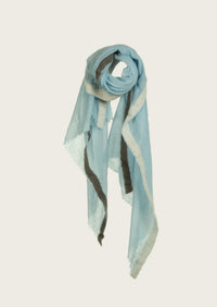 A selection of cashmere shawls tailored for women, showcasing exquisite textures and versatile styles for every occasion