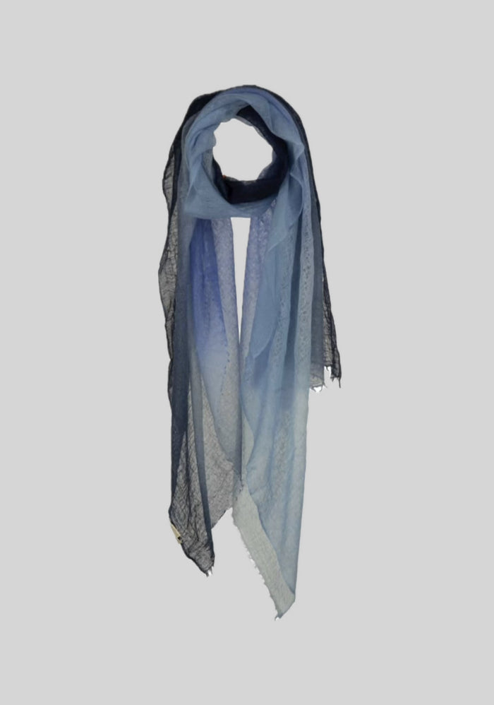 A chic dip dye scarf, featuring captivating color transitions for a trendy and eye-catching look.