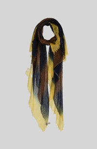  felted cashmere scarf displayed against a neutral background, highlighting its luxurious texture and craftsmanship.
